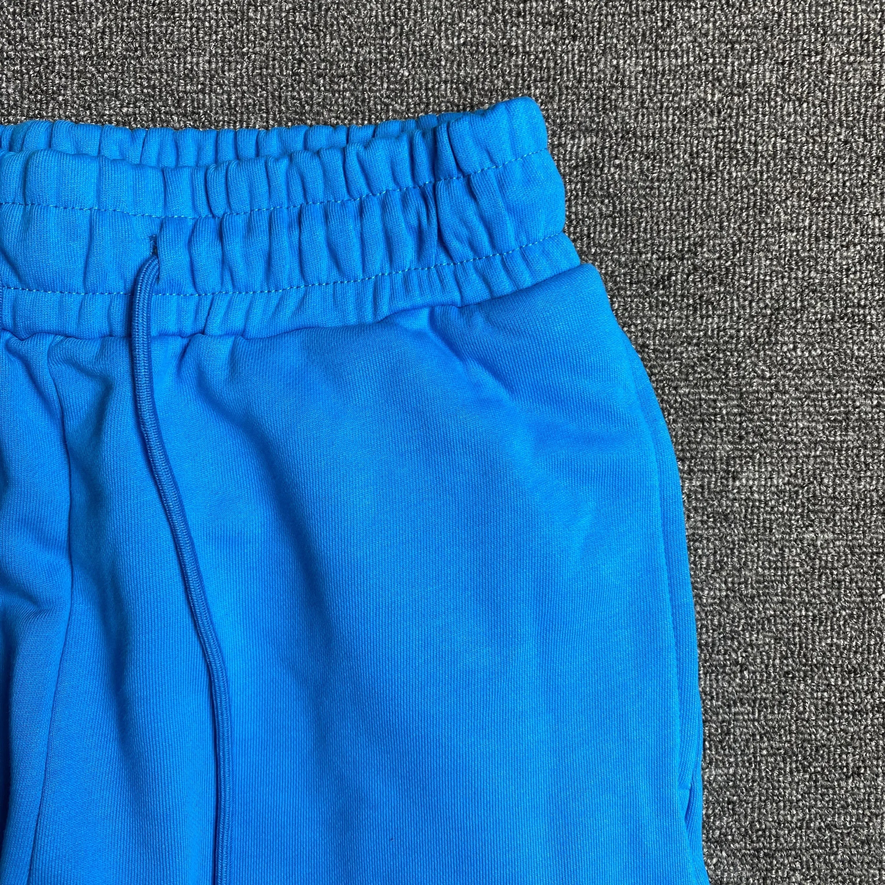 DENIM TEARS COTTON WREATH SWEATPANTS AZURE BLUE