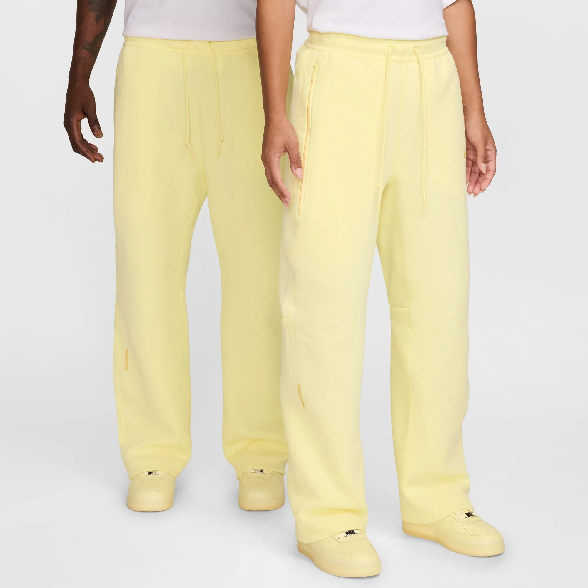 NOCTA TECH FLEECE OPEN HEM PANTS "CITRON TINT"