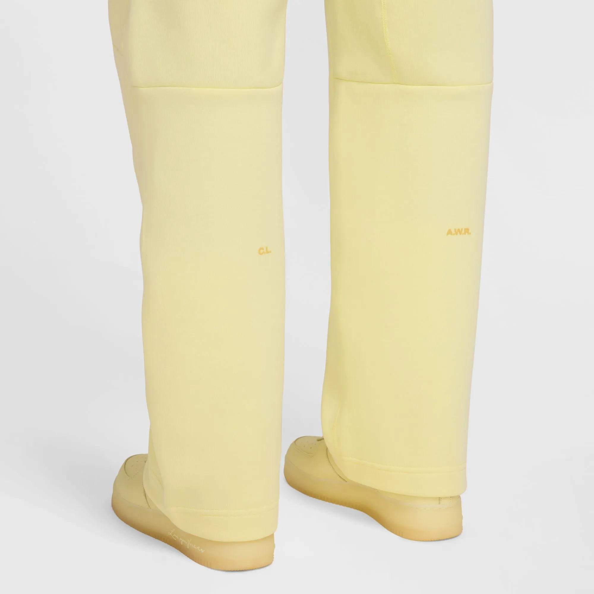 NOCTA TECH FLEECE OPEN HEM PANTS "CITRON TINT"